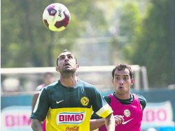 Coapa. Daniel Montenegro y el ahora lesionado Adrián Aldrete, durante el entrenamiento del lunes con las Águilas. MEXSPORT  /