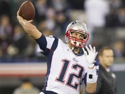 Tom Brady lanzó tres pases de anotación. XINHUA  /