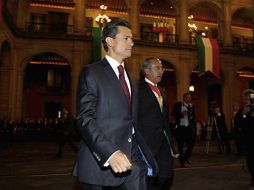 Felipe Calderón y Enrique Peña Nieto se retiran después de la ceremonia de la entrega de mando. EL UNIVERSAL  /