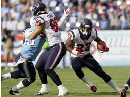 Arian Foster (23) fue importante en la victoria de los Texanos.AP  /