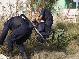 Los municipales de Tlaquepaque encontraron la maleta en una brecha conocida como ''La Loma''. ARCHIVO  /