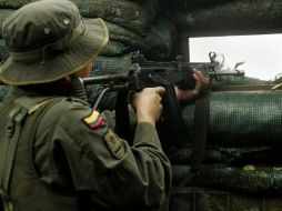 El mismo día que comenzaban las negociaciones, la guerrilla anunció un alto el fuego unilateral. ARCHIVO  /