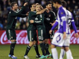 Özil anotó el empate a dos al minuto 45 y en en 72, el 3-2 definitivo. AP  /