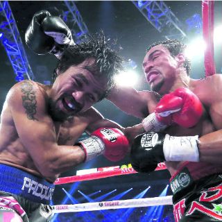 La cuarta es la vencida; Márquez fulmina a Pacquiao por nocáut
