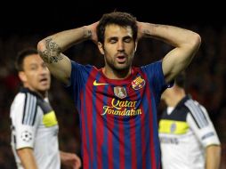 Tras fuertes dolores, Fàbregas (foto) fue sustituido en el partido de ayer por Alexis Sánchez. MEXSPORT  /