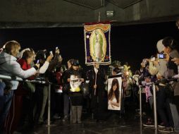Con porras y cantos los participantes recorrieron ocho calles hasta llegar a la Basílica de Guadalupe. REUTERS  /