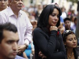 Simpatizantes de Chávez rezan por la salud del mandatario venezolano. REUTERS  /