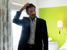 John McAfee pasó de un centro de detención en Guatemala a un cómodo hotel en Miami. AP  /
