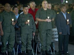 Militares y funcionarios del gobierno venezolano acuden a una misa para pedir por la salud de Chávez. AFP  /