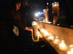 Los vecinos de Sandy Hook se debaten entre la incredulidad, el horror y la desolación tras la matanza. AFP  /