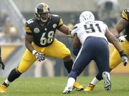 Pittsburgh (de negro) busca una de las plazas de equipo comodín de la Conferencia Americana. ARCHIVO  /