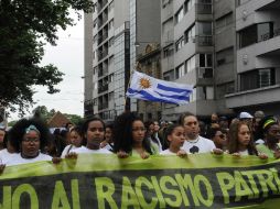 Más de tres mil personas fueron parte de la ''Marcha de las Motas''. AFP  /