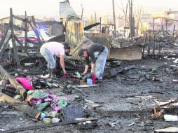 Precarias. Más de 70 adultos y 86 niños se quedaron sin hogar. Las viviendas eran de cartón. EL UNIVERSAL  /