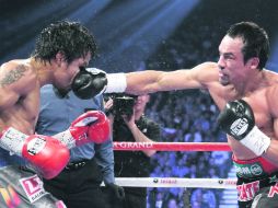 Máquez Vs. Pacquiao IV. En la pelea del año no hubo un cinturón en juego, per sí el orgullo y la credibilidad. AP  /