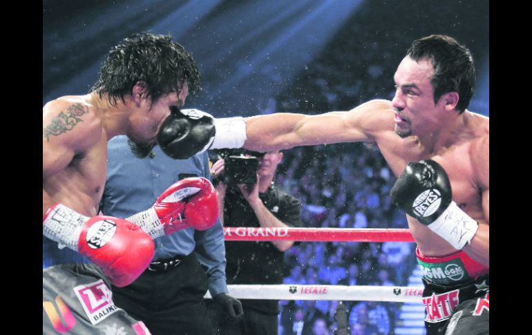 Máquez Vs. Pacquiao IV. En la pelea del año no hubo un cinturón en juego, per sí el orgullo y la credibilidad. AP  /