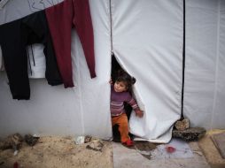 Un niño sirio refugiado en la frontera con Turquía. REUTERS  /