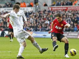 Hernández Balcázar (d) entró de cambio a los 62 minutos. XINHUA  /