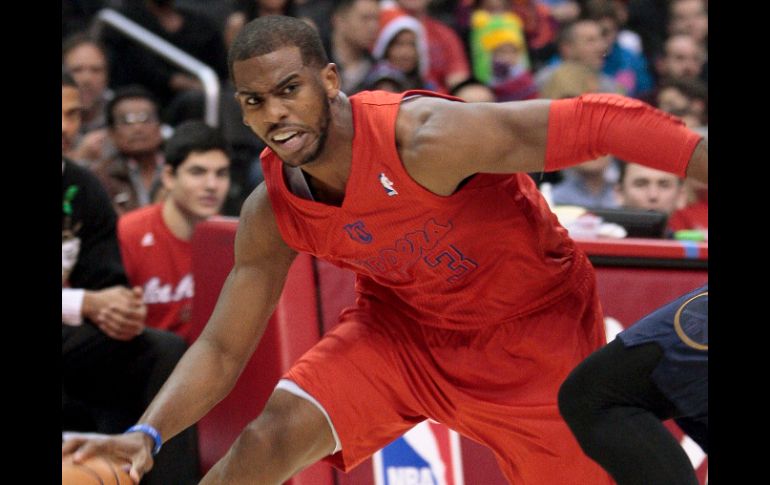 El base Chris Paul aportó 14 puntos, ocho asistencias, cuatro rebotes y tres recuperaciones de balón. AP  /