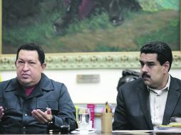 El mandatario venezolano firmó el pasado 9 de diciembre el decreto que le confiere a Nicolás Maduro tomar decisiones. AP  /