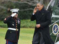 Obama llegó este jueves por la tarde a la Casa Blanca, luego de un viaja a Hawai. AFP  /