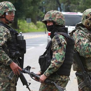 Intentan rescatar cuerpo de presunto líder de grupo delictivo