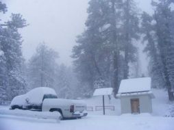 Protección Civil recomienda no circular por algunas carreteras, pues la nieve podría ocasionar accidentes vehiculares. XINHUA  /