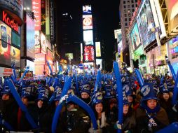 Decenas de miles acuden al Times Square para recibir el 2013. AFP  /
