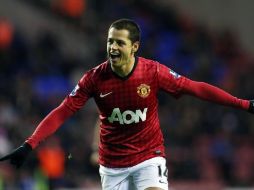 Apenas el martes pasado, el seleccionado mexicano le hizo dos goles al Wigan. XINHUA  /