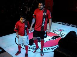 Los Xolos de Tijuana presentan su nuevo uniforme que los jugadores portaran en el Clausura 2013. NTX /
