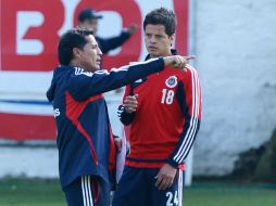 Benjamín Galindo, el nuevo técnico de Chivas, con el Cherokee Pérez. EL INFORMADOR /