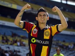 Christian Antonio Díaz celebra uno de los goles de los Leones Negros en el partido.  /