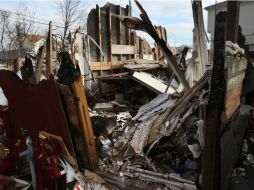 El huracán destruyó o dañó cientos de miles de instalaciones empresariales e infraestructuras. AFP /
