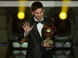 El argentino ganó ayer el Balón de Oro por cuarta ocasión en su carrera. XINHUA /