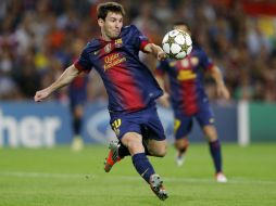 Roura calificó de ''descomunal'' lo conseguido por el argentino. AP /