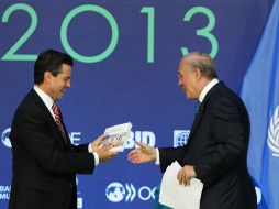 Enrique Peña Nieto y José Ángel Gurría participan en el Foro México 2013. EFE /