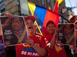 Partidarios de Hugo Chávez gritan consignas a favor del presidente venezolano, durante un mitin a su favor en Caracas. AP /