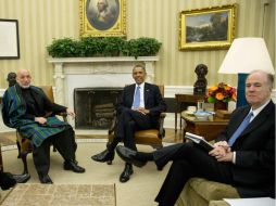 Los líderes durante la reunión privada en el resinto oficial de Obama. REUTERS /