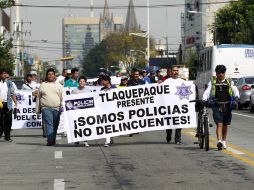 Cerca de 100 elementos de diversas corporaciones municipales se manifestaron contra el proceso de certificación de policías. EL INFORMADOR /