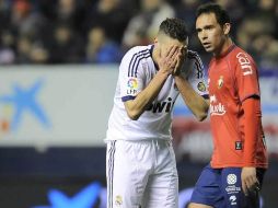 Karim Benzemá lamenta una falla en una jugada de gol en el partido. AP /