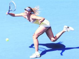 A la carrera. La rusa Maria Sharapova, número dos del ranking de la WTA, inició arrollando a su compatriota Puchkova por doble 6-0. EFE /