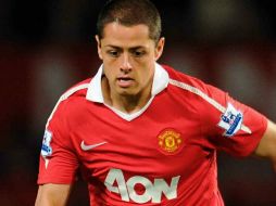 El delantero mexicano firmó hace unos meses su reovación por cinco años con los ''Red Devils''. MEXSPORT /