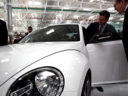 Enrique Peña Nieto en la nueva planta de Volkswagen, uvo una inversión de 500 millones dólares. SUN /