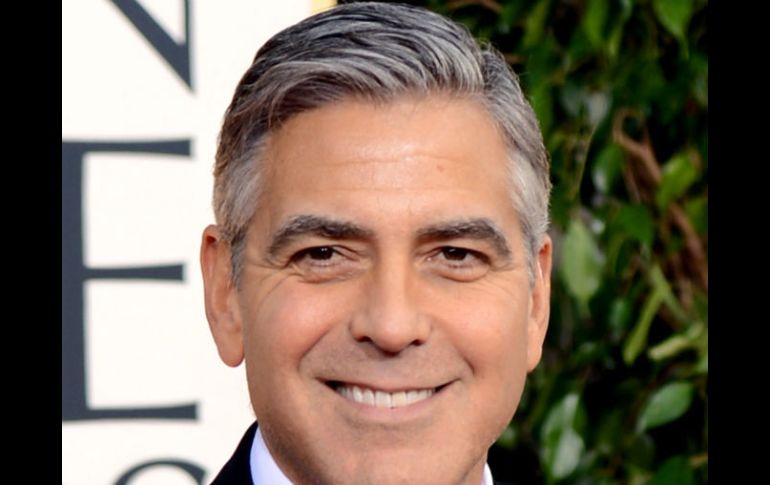 Clooney feliz por el éxito de Affleck, ganador del globo de oro a mejor director. AFP /