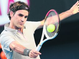 El tenista suizo Roger Feder venció al ruso Davidenko por 6-3, 6-4, 6-4. AFP /