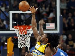 Faried al momento de encestar los puntos de la victoria. AP /