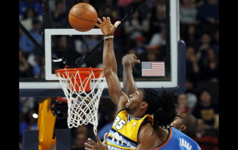 Faried al momento de encestar los puntos de la victoria. AP /