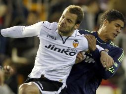 El capitán del equipo tuvo que abandonar el duelo ante los ''merengues'' en la Liga de España. EFE /