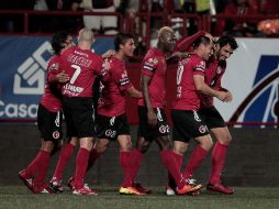 Fiel a su estilo, Tijuana se mantuvo al frente en busca de otro tanto. XINHUA /