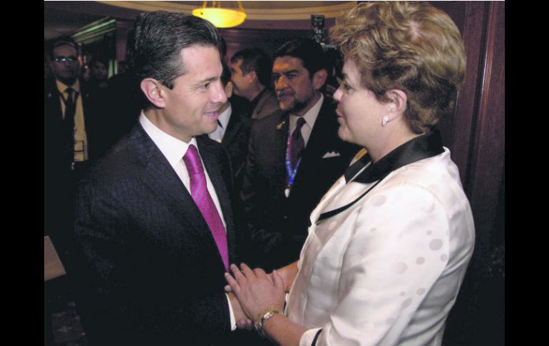Relación bilateral.Enrique Peña Nieto y la mandataria brasileña, Dilma Rousseff, sostuvieron un encuentro en Santiago de Chile. XINHUA /