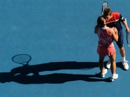 La pareja juega una gran final y contra los pronósticos, consiguen el título. AFP /